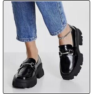 Steve Madden Trifecta Glossy Black Loafers with Metallic Accent